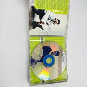 Music CD with Green and Blue Design